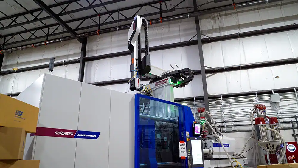 Robotic arm used in product development at BMI-Corp staging site.